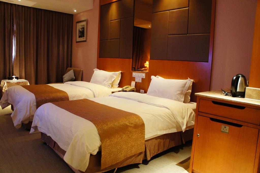 Oriental Hotel Tong Xiang Jiaxing Habitación foto