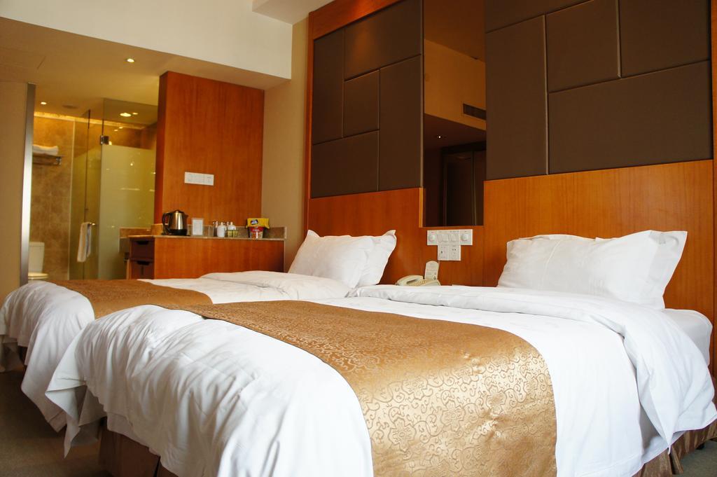 Oriental Hotel Tong Xiang Jiaxing Habitación foto