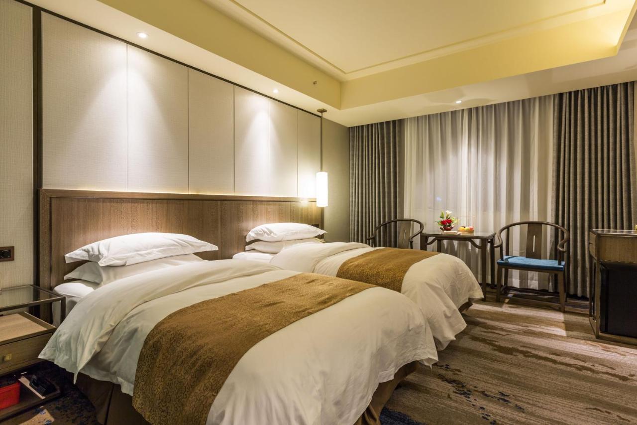 Oriental Hotel Tong Xiang Jiaxing Exterior foto